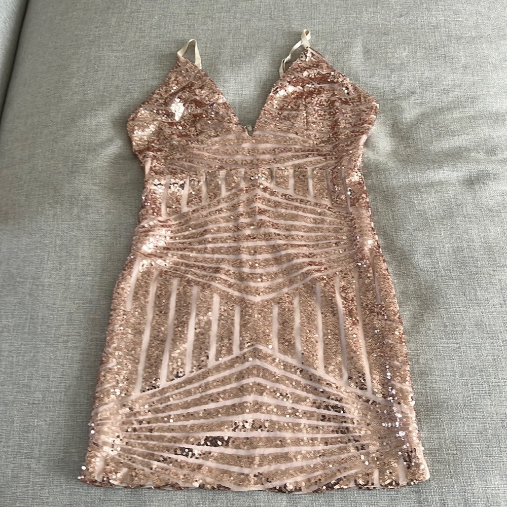 Blush pink sequin dress. Size large fits like a medium. Never worn.